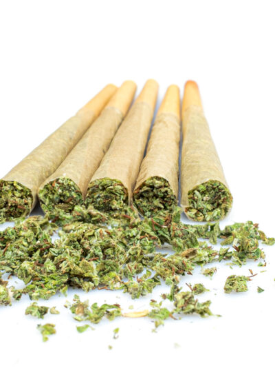 Marijuana joint pre-rolled cone paper on white background,  roll paper cannabis
